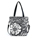 Front Black and white Cykochik custom Botanica floral eco-canvas vegan crossbody/tote bag by artist Jody Pham